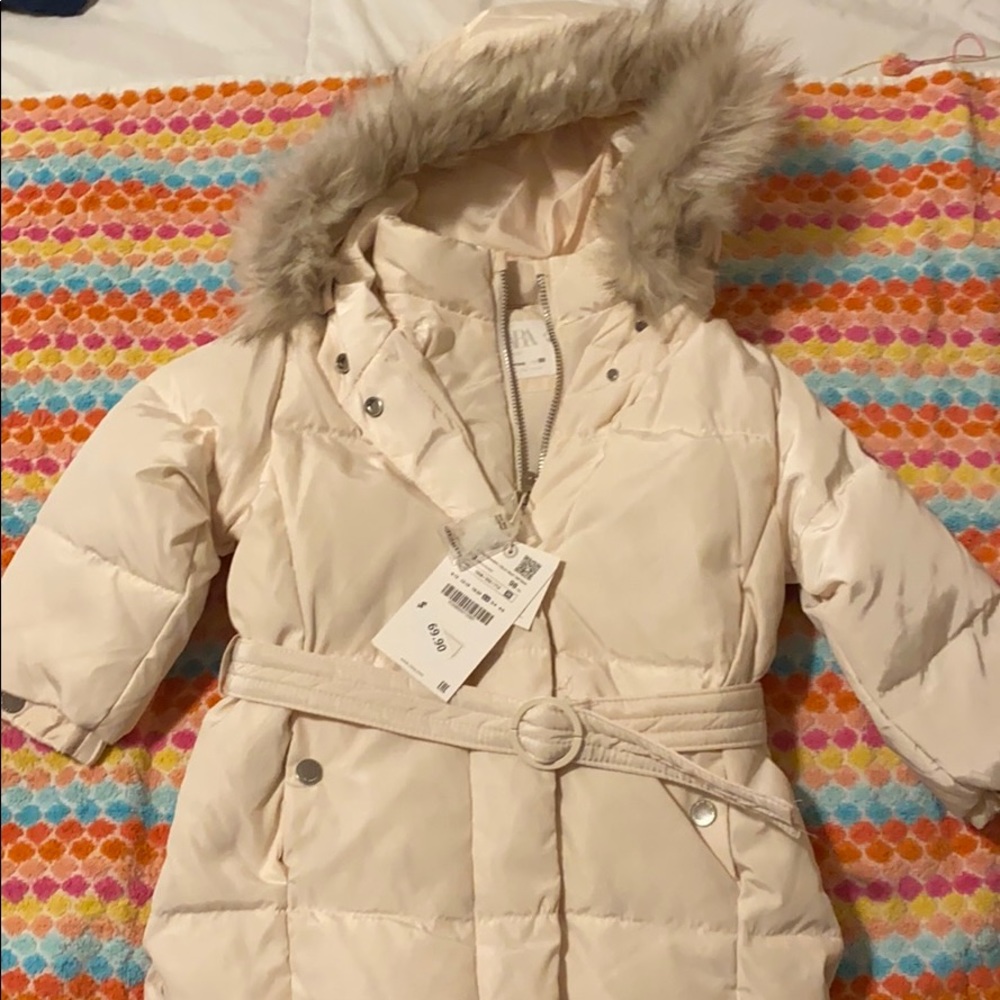 White puffer coat with fur hood